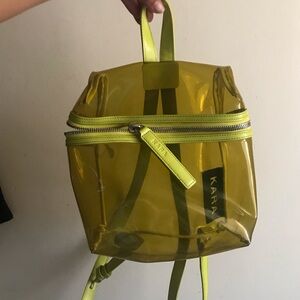 Kara Transparent mini Backpack in Neon green/yellow